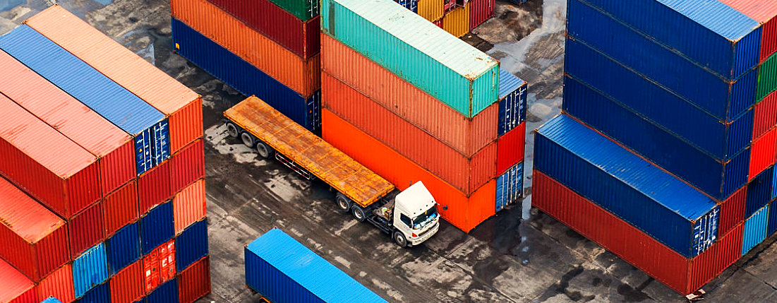 freight containers at the docks with truck